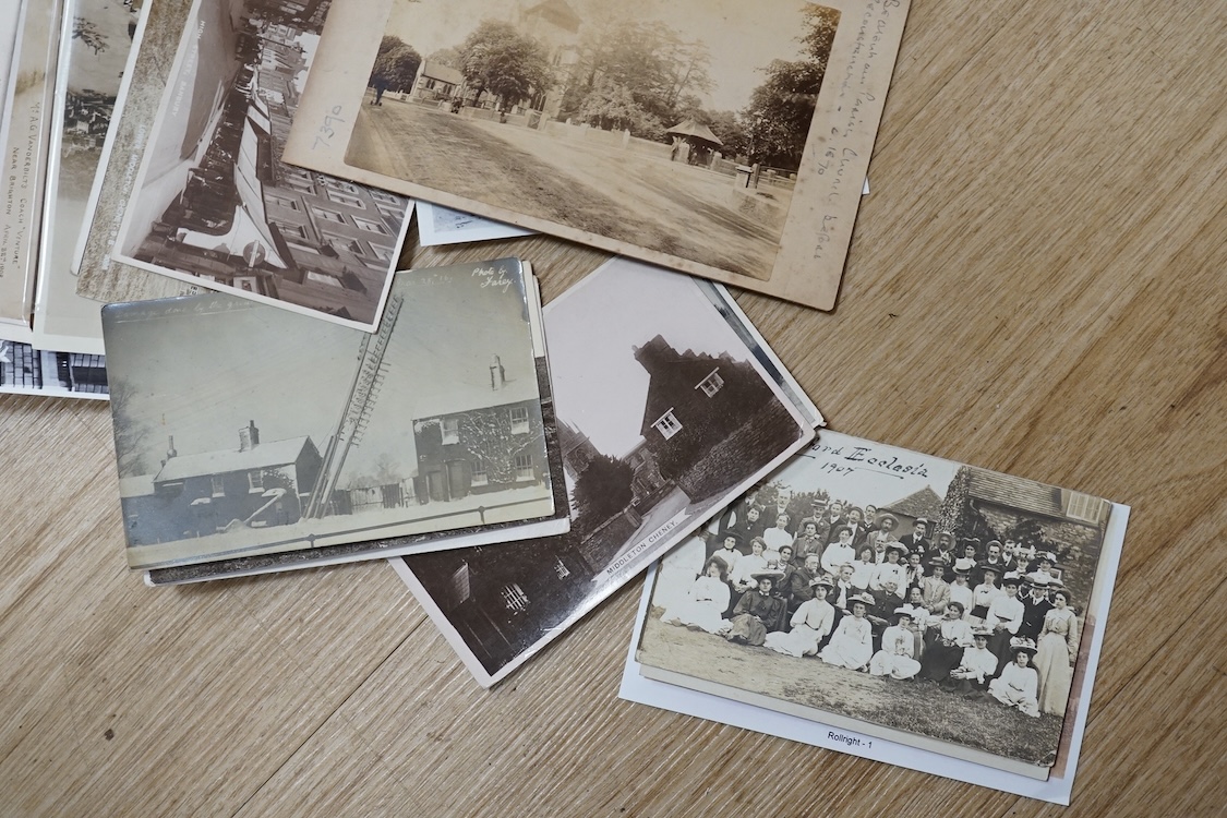 A collection of early 20th century postcards, photographs, etc. Including three albums of novelty postcards, scenes of London, etc. First World War postcards, etc. and an Edwardian photograph album, together with four bo